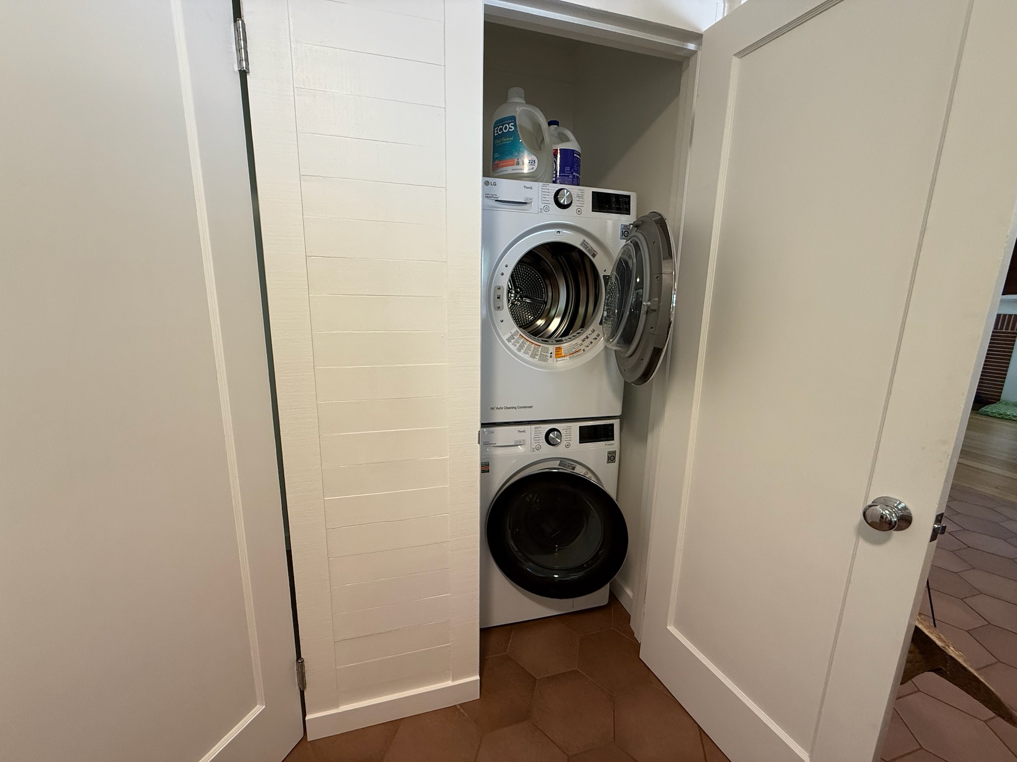 Convenient, modern laundry tucked behind discreet doors — ready for extended stays in wine country comfort.