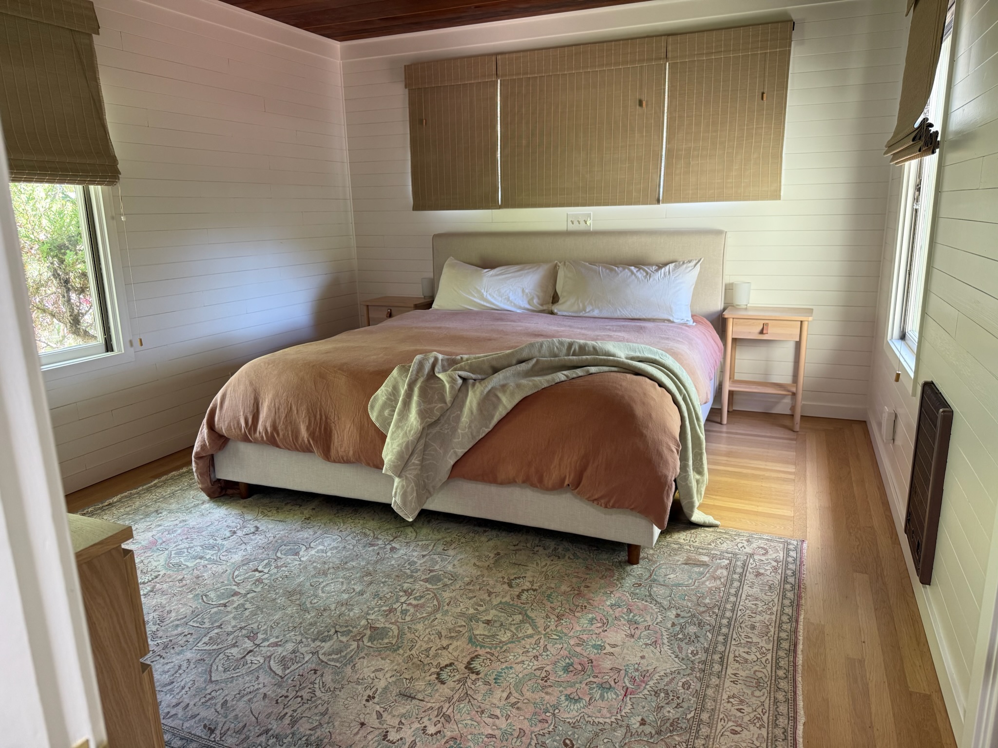 The primary suite: a calming retreat framed by soft natural light, layered textures, and vineyard breezes.