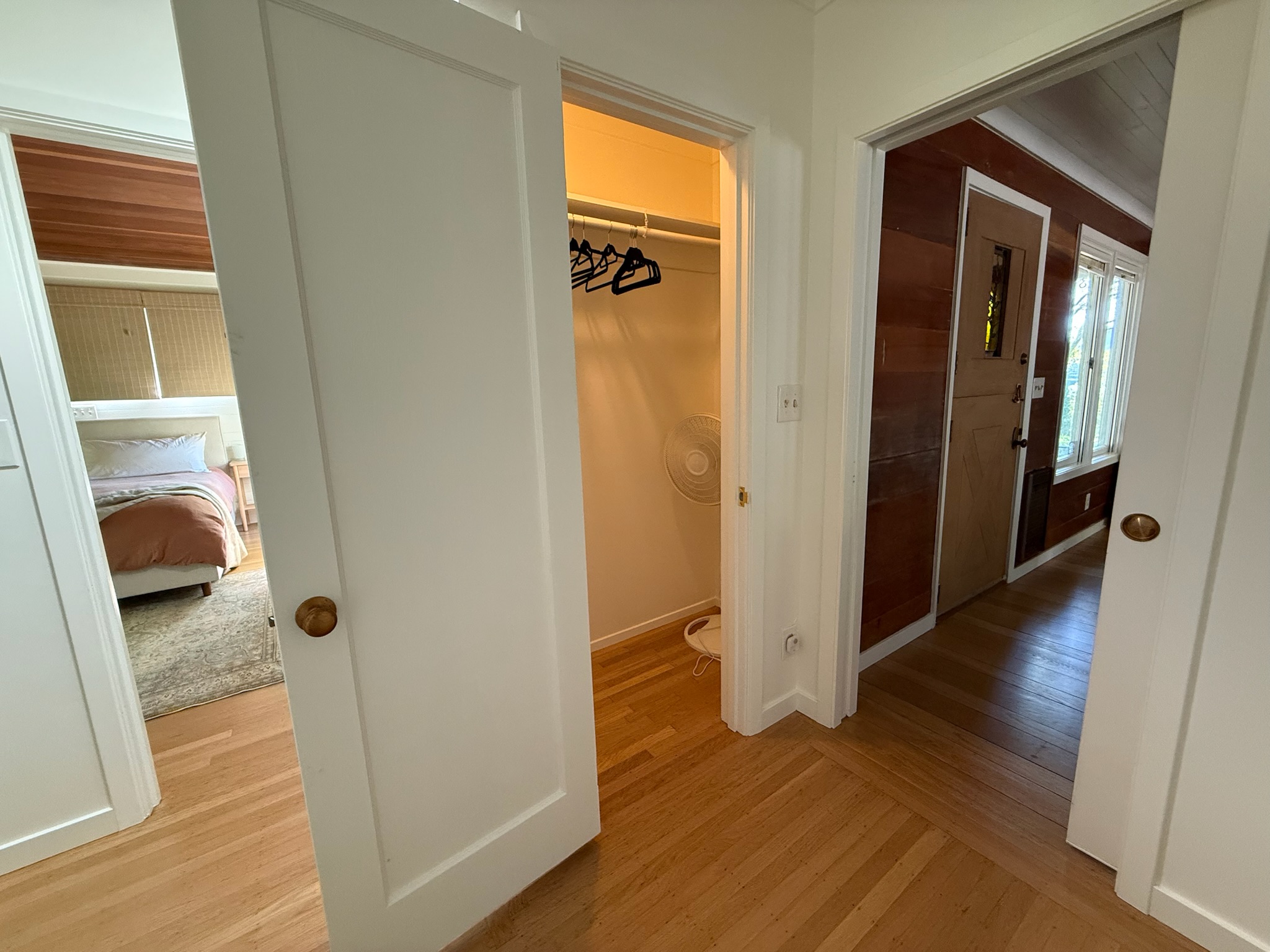 Inviting hallway with classic architectural details, connecting spaces designed for easy, elegant living.