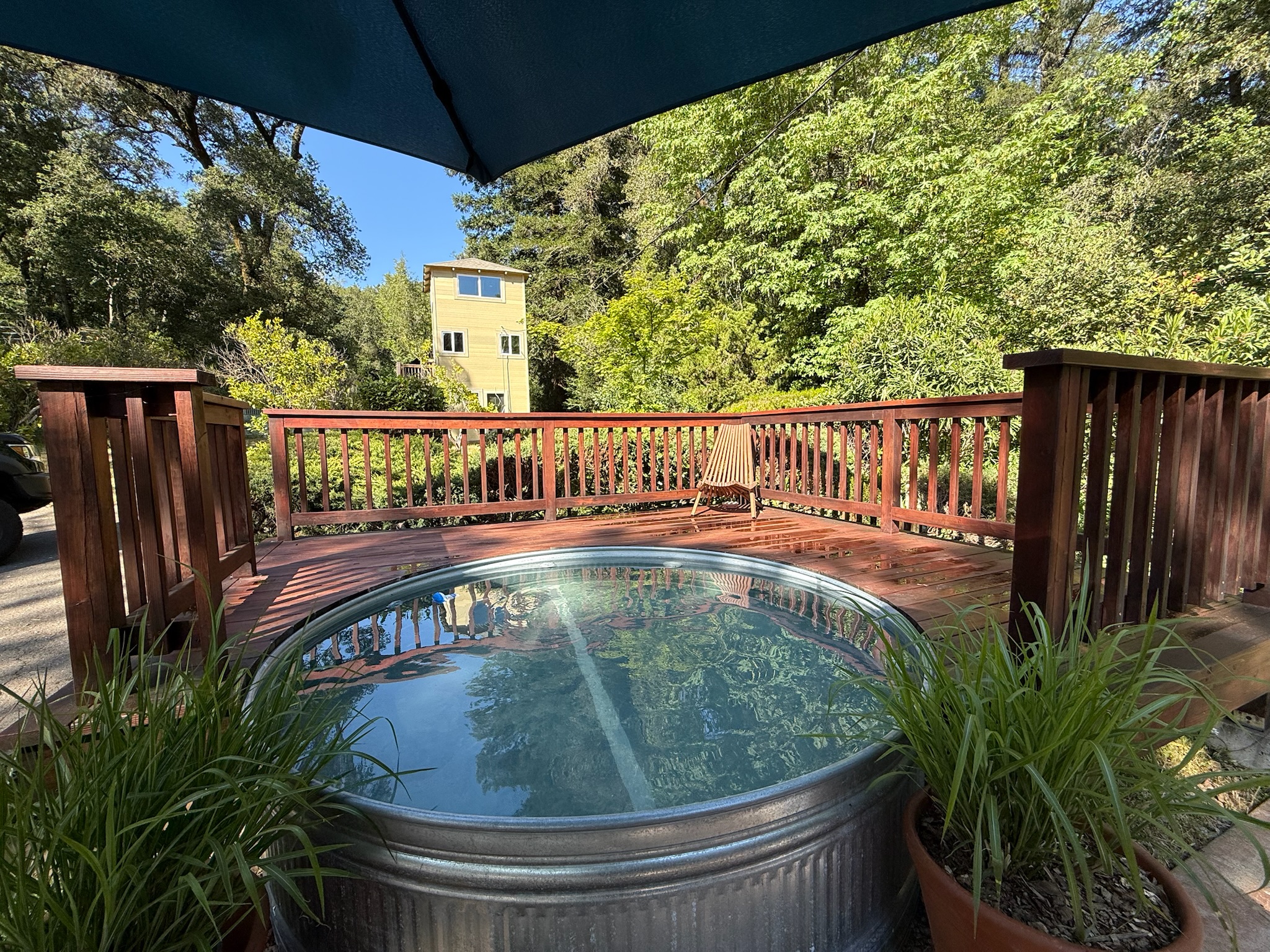 At the heart of the patio, a heated stock tank pool offers a refreshing or cozy dip depending on the season — a rare and charming touch for a true wine country escape.